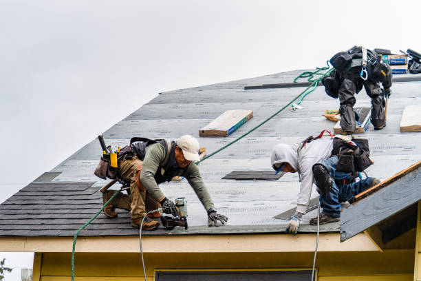 Professional Gutter Installation technician working in Medway, ME